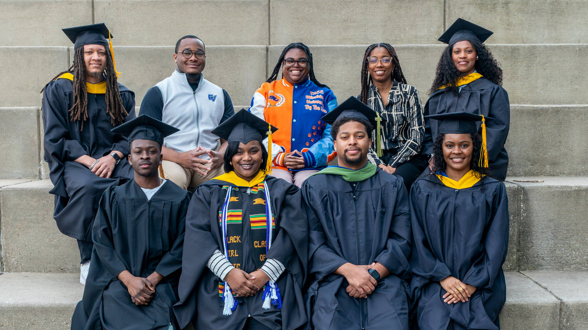GVSU students from the HBCU consortium (bottom row, from left) Jourdan Watson, Rashawny Alic, Kobe Rhynes, Skye Gerald (top row, from left) Quinton Randall, Xavier Wright, Latrella Jackson, Janina Mayers and Darriel Wright, pose for a portrait outside...